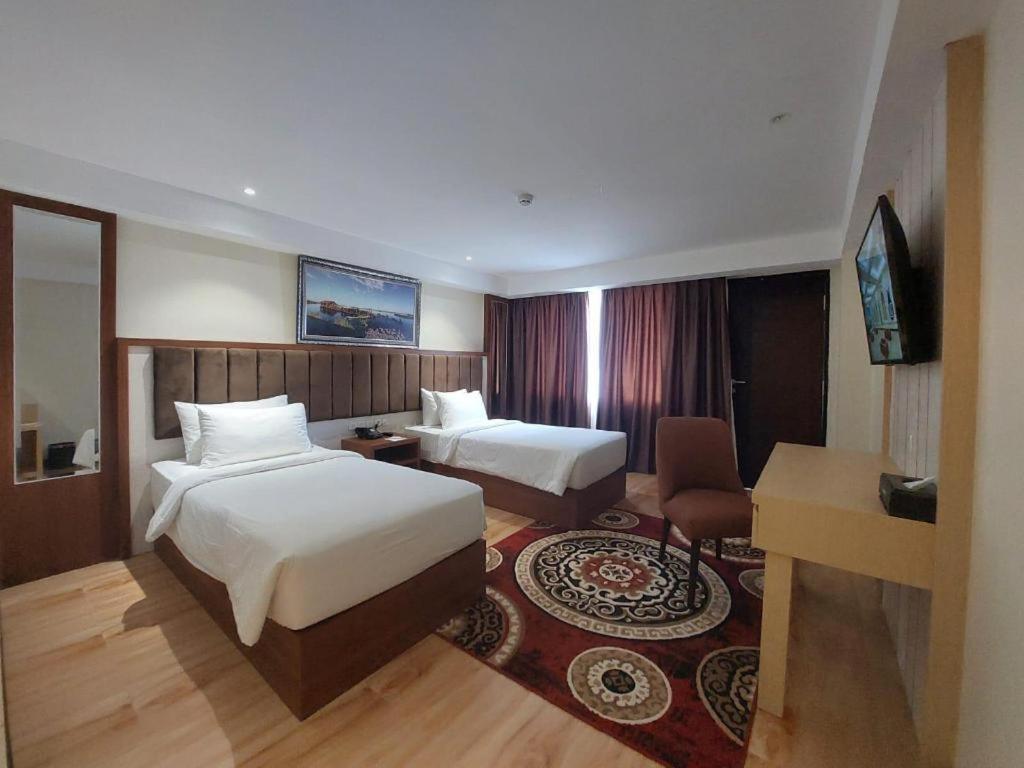 Grand Qin Hotel Banjarbaru Extérieur photo